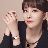 Woman wearing Tera High Power Gauss Magnetic Therapy Necklace and bracelet for sports performance and energy recovery.