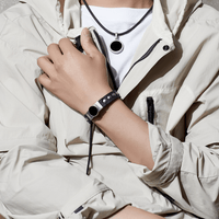Hero High Power Gauss Magnetic Therapy Bracelet worn by person in jacket, ideal for athletes, wellness, sport performance, golf recovery.