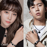Models wearing Clavis Hero High Power Gauss Magnetic Therapy Bracelet & Necklace Set in black rose gold for energy recovery.
