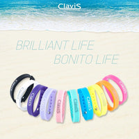 Assorted Clavis athletic edition energy balance bracelets on beach background, ideal for magnetic therapy and sport performance.
