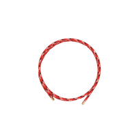 Red magnetic golf bracelet for sports performance and energy recovery.