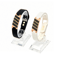 Dona High Power Health Magnetic Bracelets in Black and Rose Gold, featuring magnetic therapy for athletes and golf recovery gear.