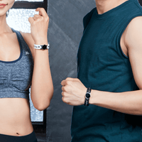 Models wearing Onyx High Power Gauss Magnetic Therapy Bracelets for sport performance and wellness, featuring premium black onyx stones.