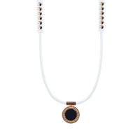 Onyx magnetic therapy necklace with white band and rose gold accents, crafted for athletes and wellness, Clavis edition for energy recovery.
