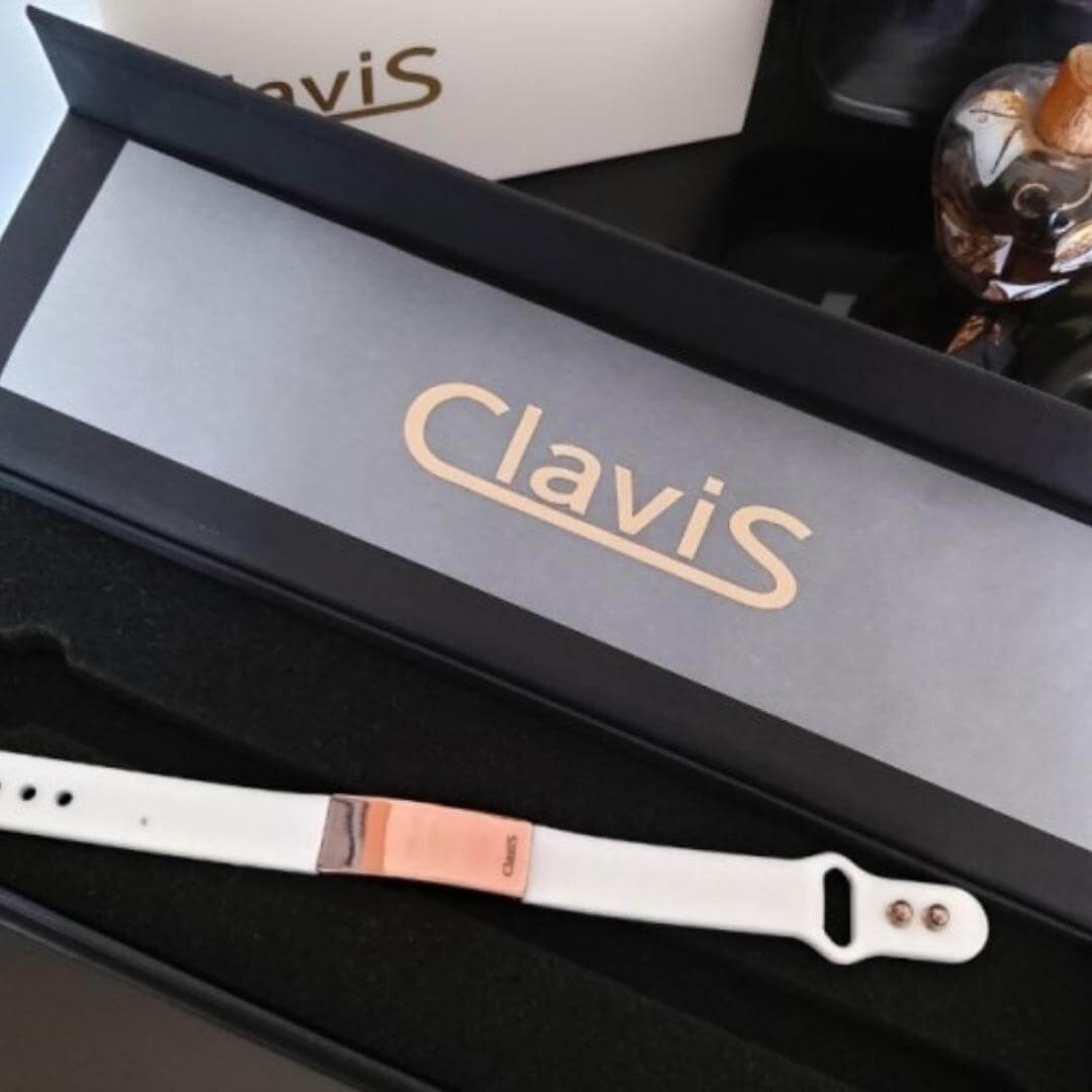 Magnetic golf bracelet for energy, sport performance, and recovery with black band rose gold by Clavis Athletic Edition.