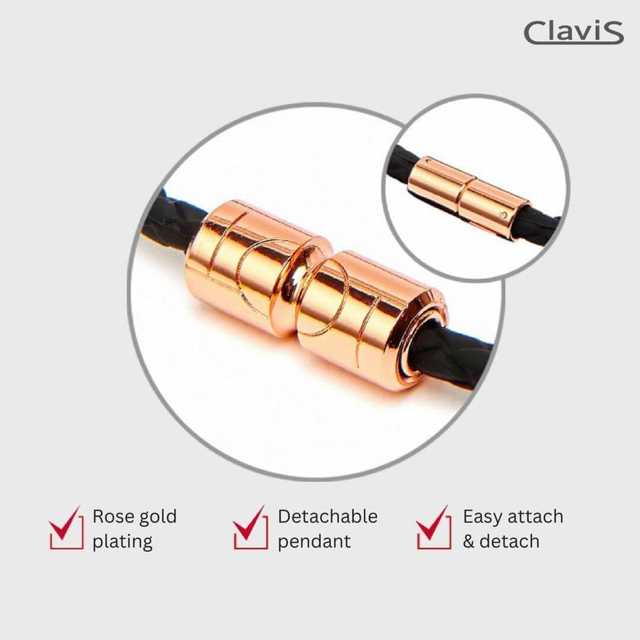 Rose gold detachable magnetic pendant on Clavis athletic bracelet for performance and recovery.