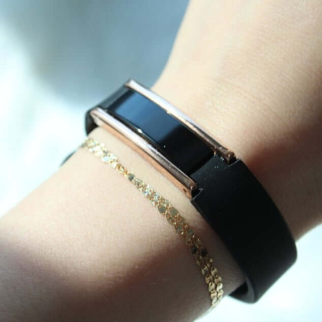 Hera High Power Gauss Magnetic Therapy Bracelet in black and gold, perfect for enhanced sport performance and energy recovery.