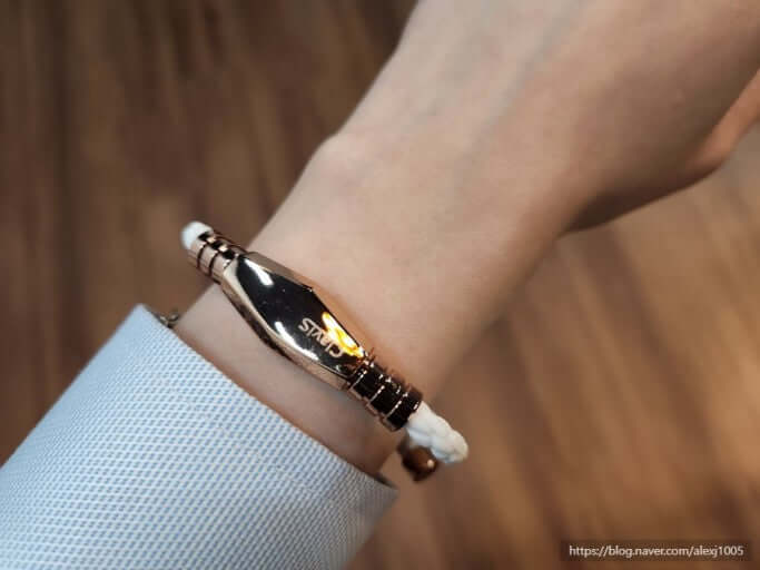 Close-up of Ares Ultra Strength Magnetic Therapy Bracelet in White Rose Gold, promoting pain relief and energy recovery for athletes.